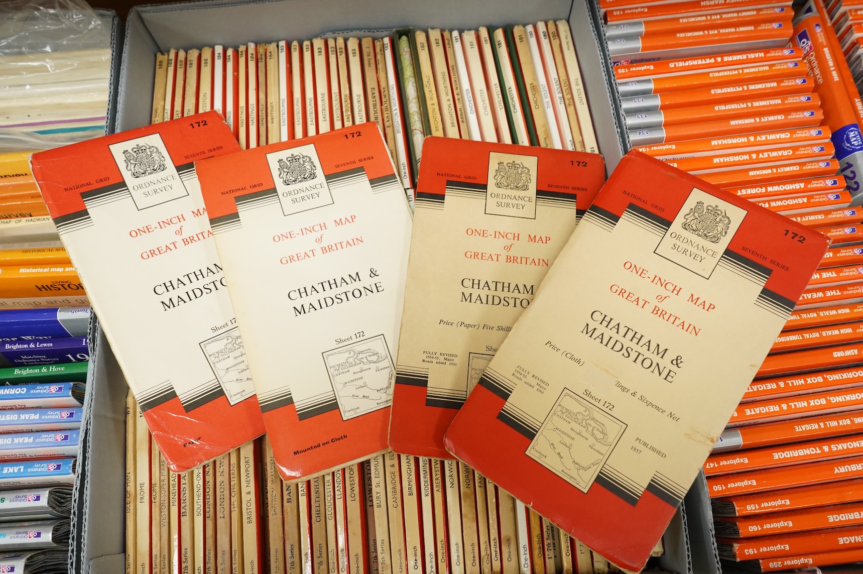 A collection of Ordnance Survey maps including Explorer series 1:25,000, Seventh Series One Inch, together with miscellaneous touring and historic editions (3 boxes)